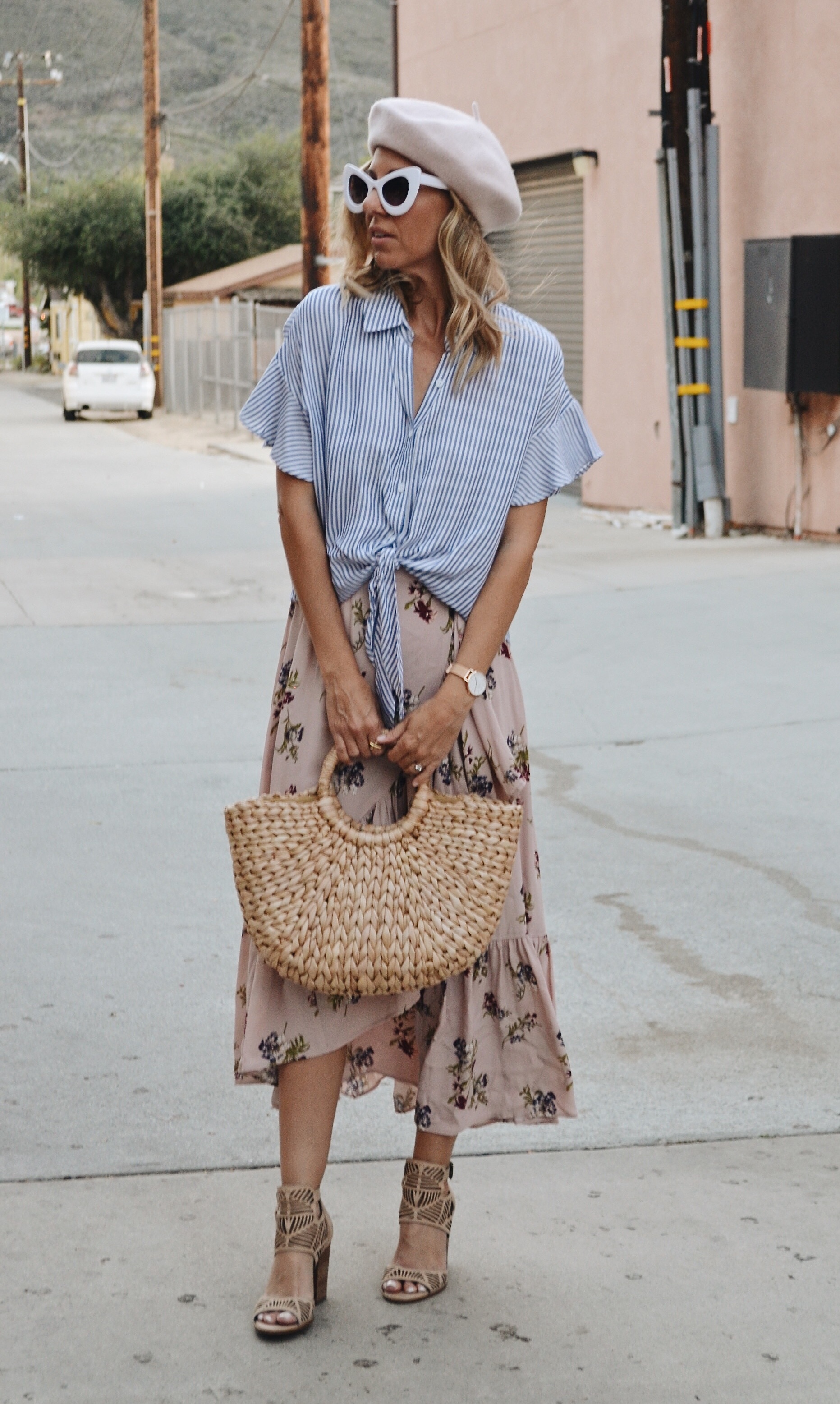 FLORAL + STRIPES - JACLYN DE LEON STYLE + striped top with ruffle sleeve + floral ruffle midi skirt + straw handbag + retro sunglasses + pink beret hat + spring outfit inspiration + street style