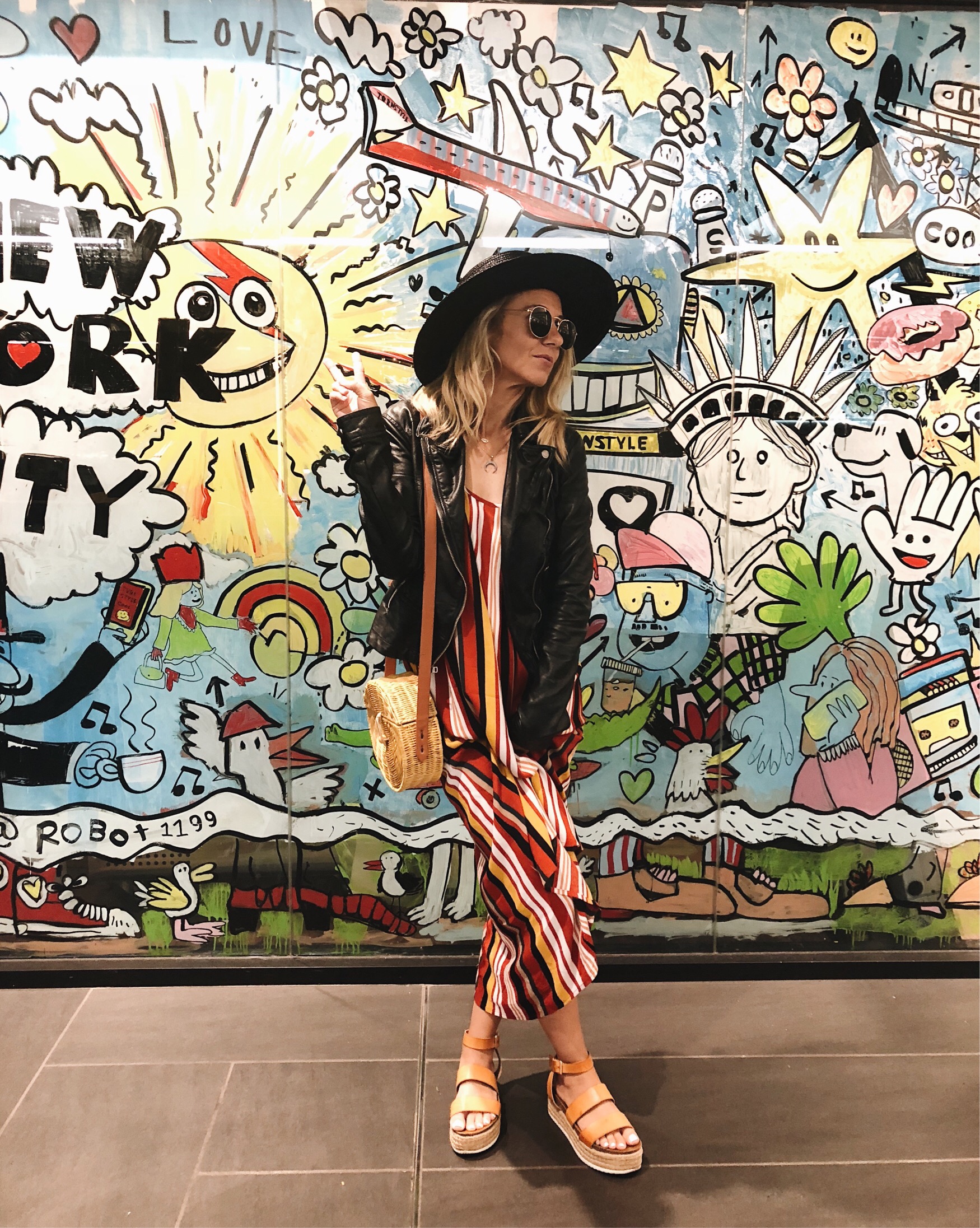 ADVENTURES IN NEW YORK- Jaclyn De Leon Style + striped maxi dress + faux leather jacket + forever 21 + platform sandals + black straw hat + straw crossbody bag + summer style + street style + what to wear in NY + boho chic