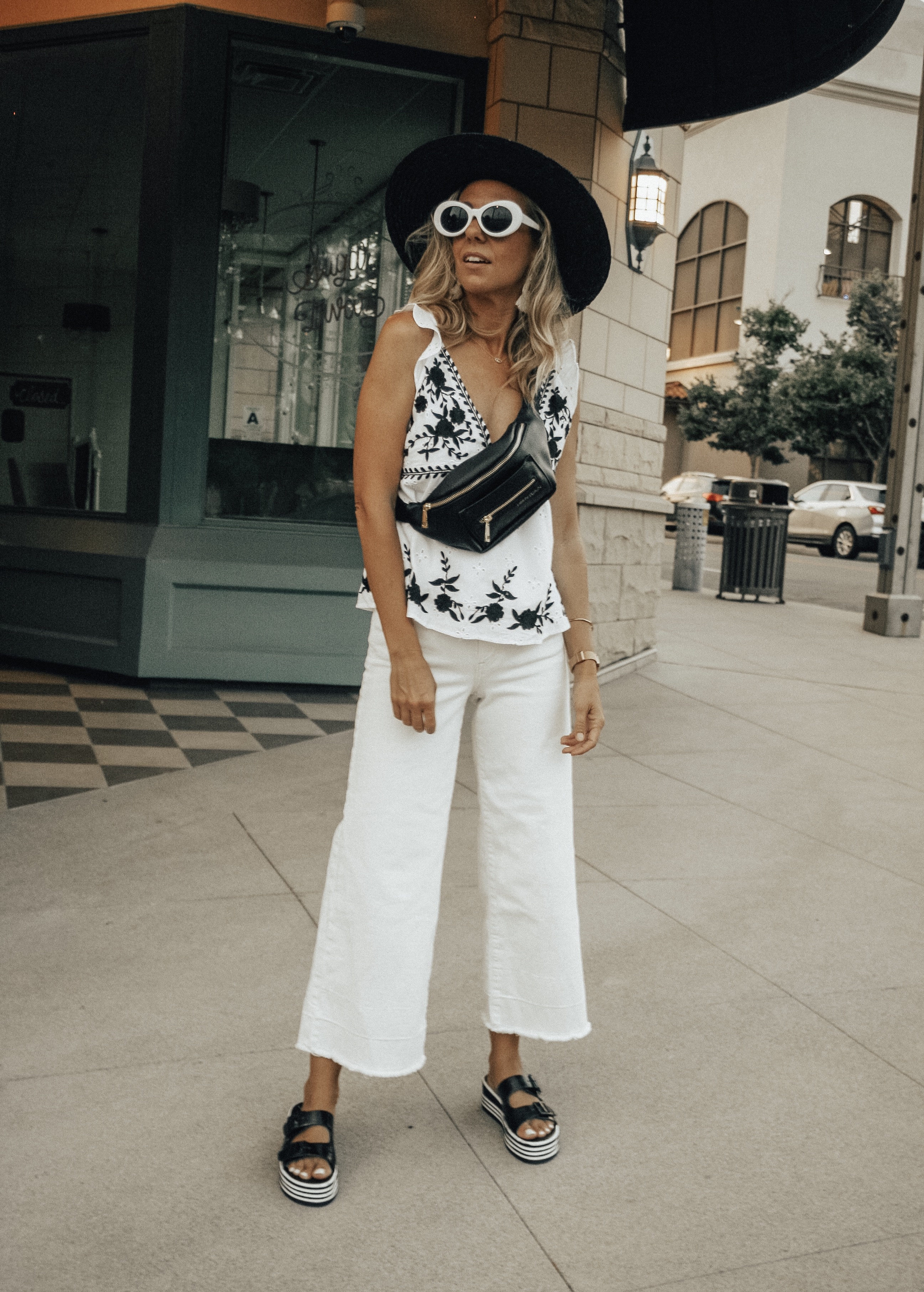 THE FANNY PACK IS BACK + 2 WAYS TO STYLE IT- Jaclyn De Leon Style + FAWN DESIGN FAWNY PACK + CASUAL STREET STYLE + MOM STYLE + BELT BAG + SUMMER OUTFIT + FALL STYLE + HOW TO STYLE A FANNY PACK + 90'S STYLE + RETRO LOOK + EDGY STREET STYLE LOOK +BLACK AND WHITE EMBROIDERED TOP + WHITE CULOTTES + YELLOW JUMPSUIT