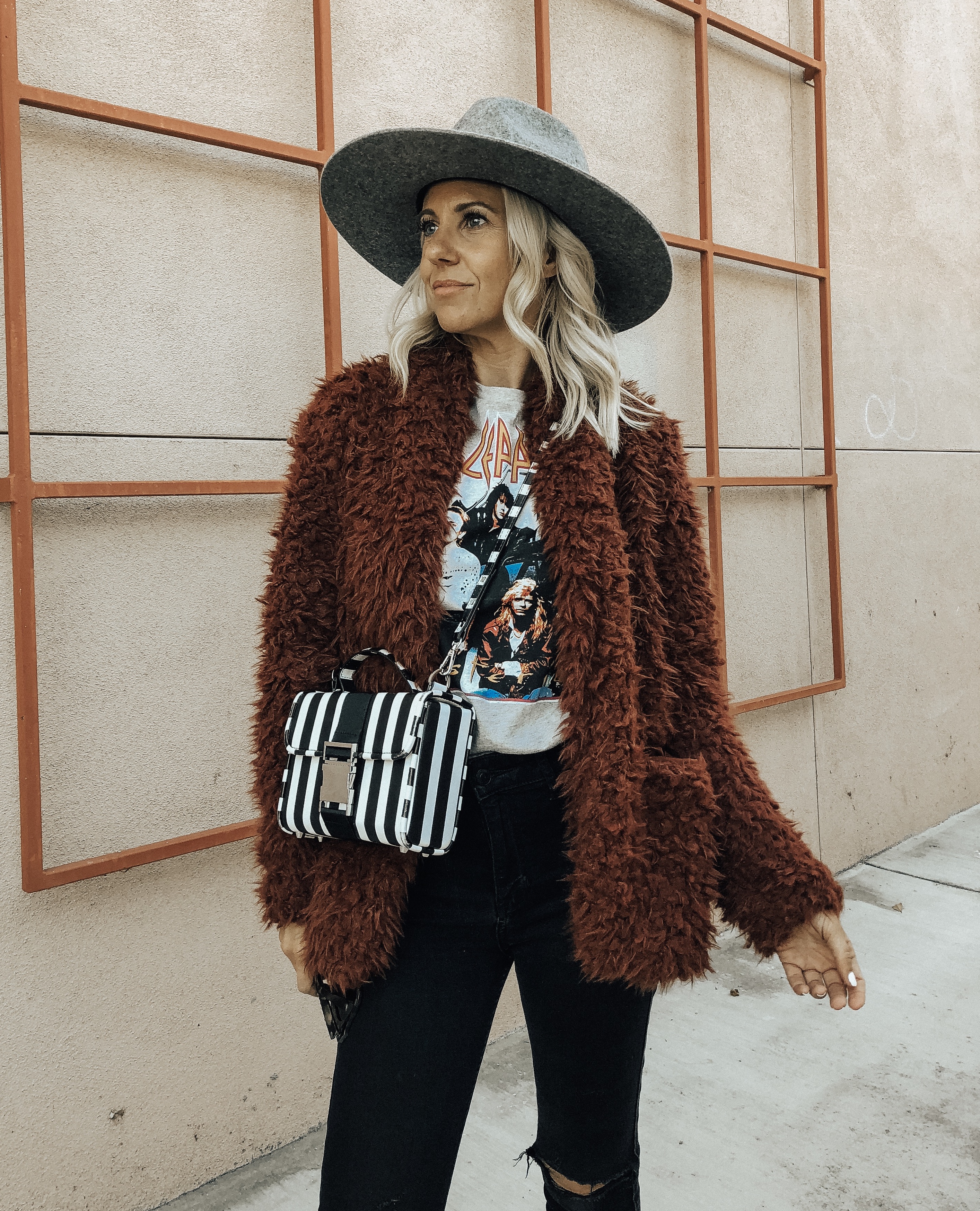 NORDSTROM RACK FINDS- Jaclyn De Leon Style + faux fur jacket + fall fashion + shopping tips + cozy casual outerwear + winter coats + street style + gray wide brim hat + band tee + striped handbag + outfit inspiration + mom style