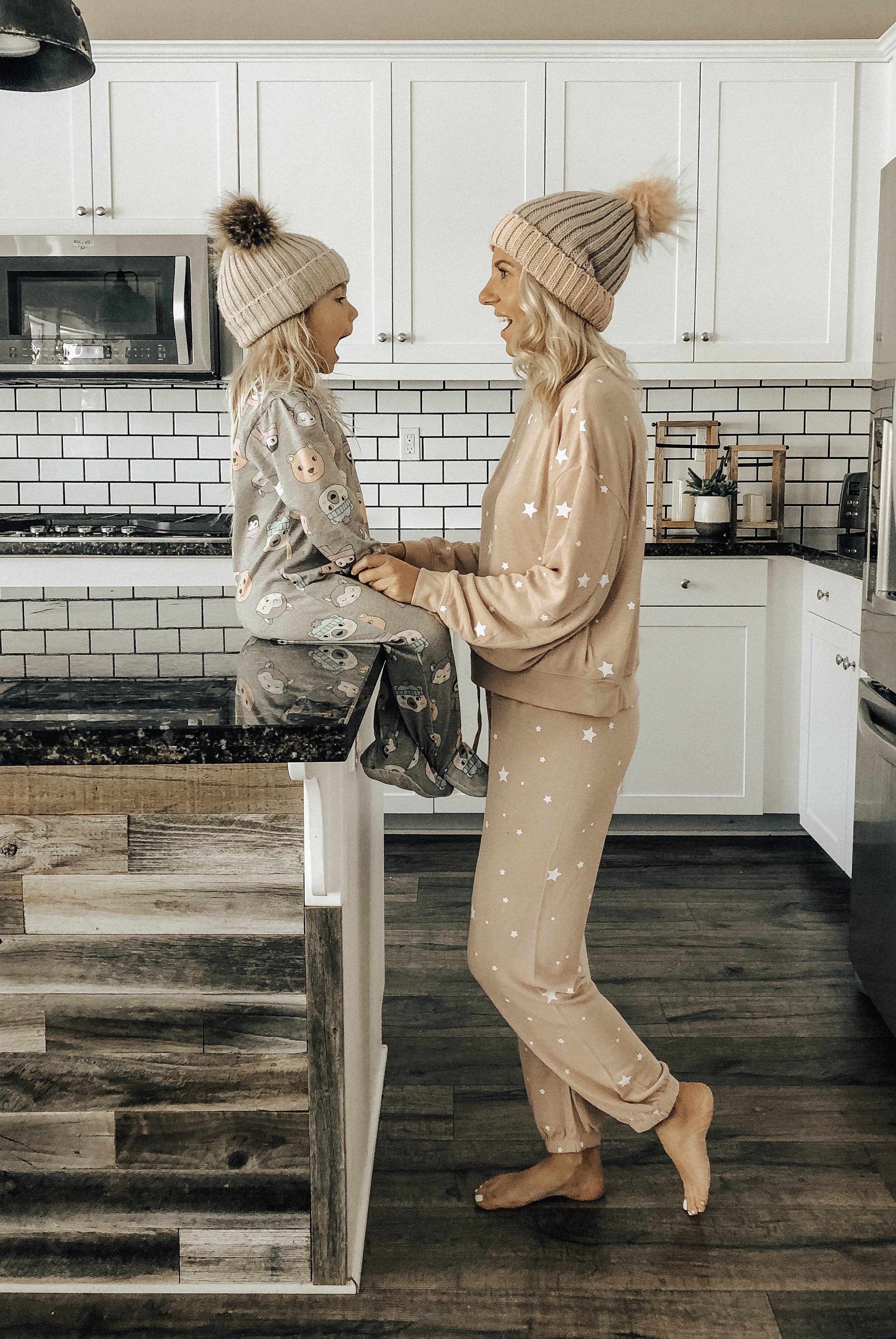 THE COZY GIFT GUIDE- Jaclyn De Leon Style + mommy and me pajamas + pom pom beanies + star print matching set + z supply + pajama onesie + target style + mom style + casual style + holiday matching looks + cozy