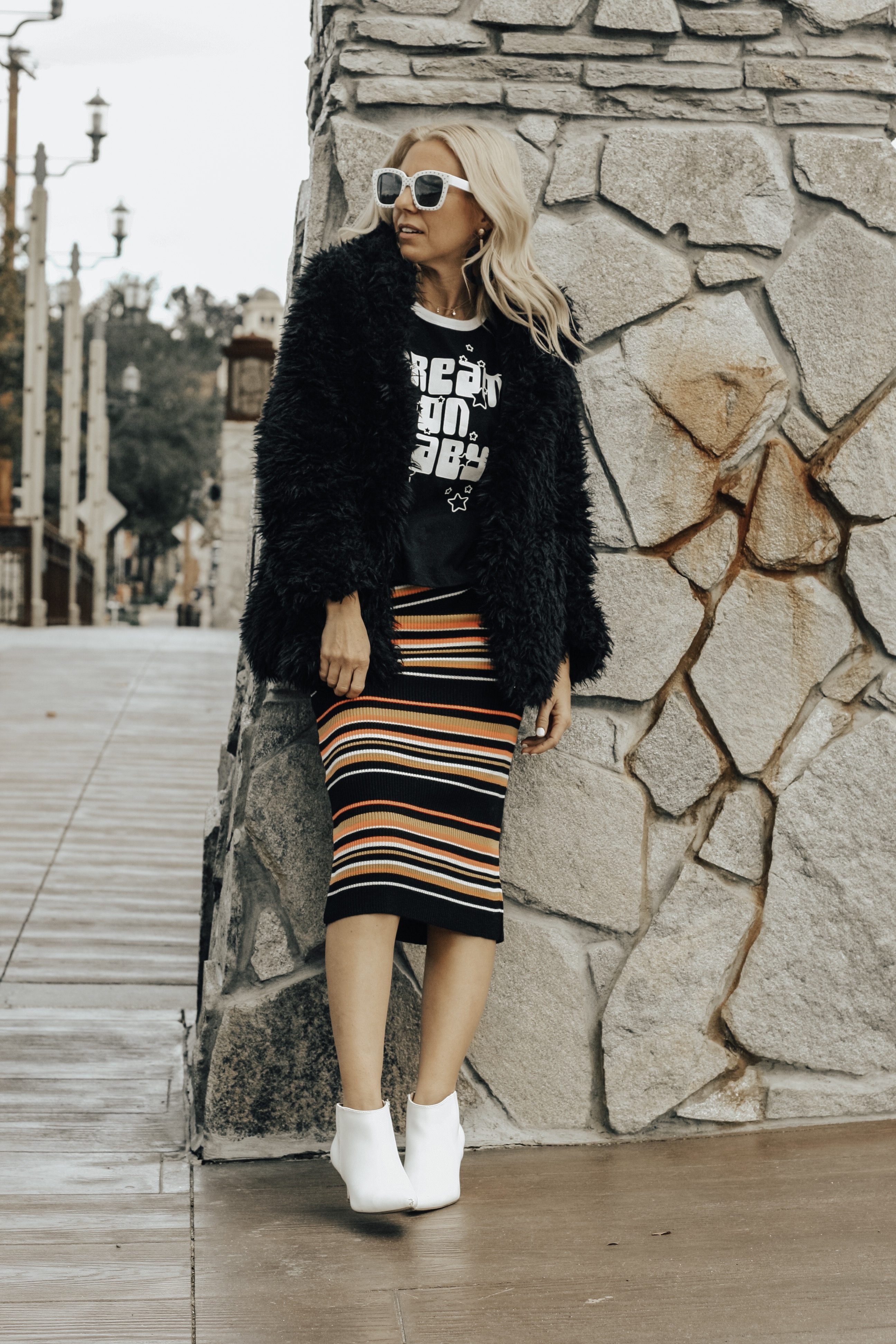 DREAM ON BABY...MY GOALS FOR 2019- Jaclyn De Leon Style + graphic tee + faux fur jacket + striped midi skirt + white boots + retro 70's style + winter style + casual street style look + what to wear in 2019