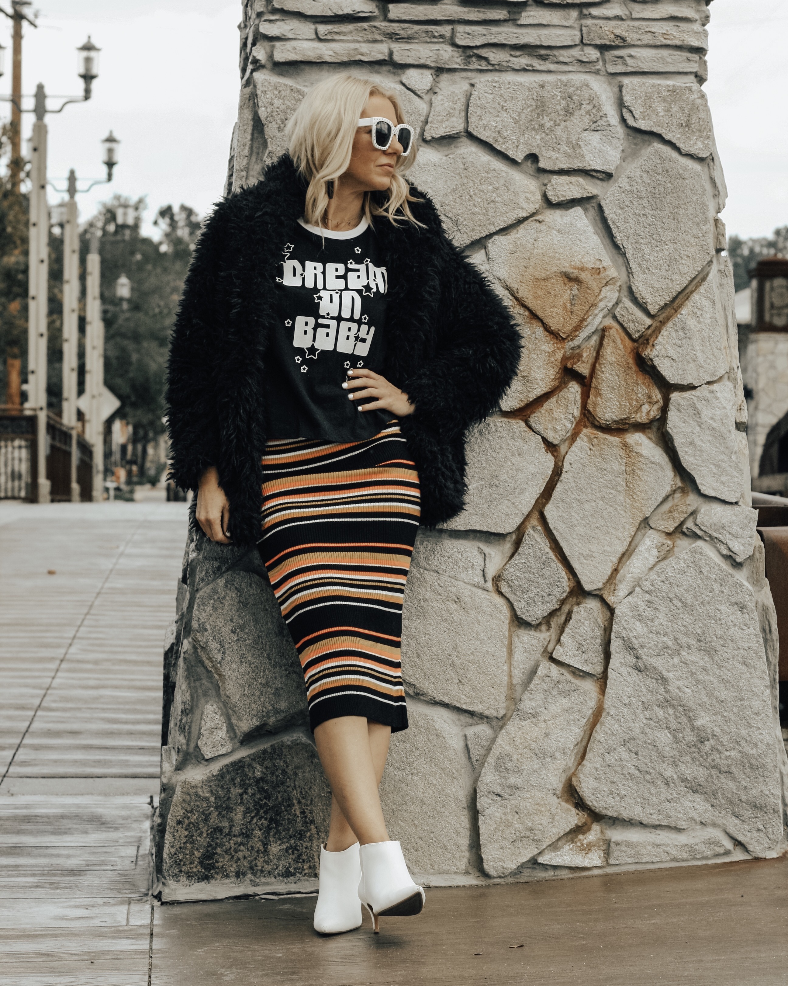 DREAM ON BABY...MY GOALS FOR 2019- Jaclyn De Leon Style + graphic tee + faux fur jacket + striped midi skirt + white boots + retro 70's style + winter style + casual street style look + what to wear in 2019