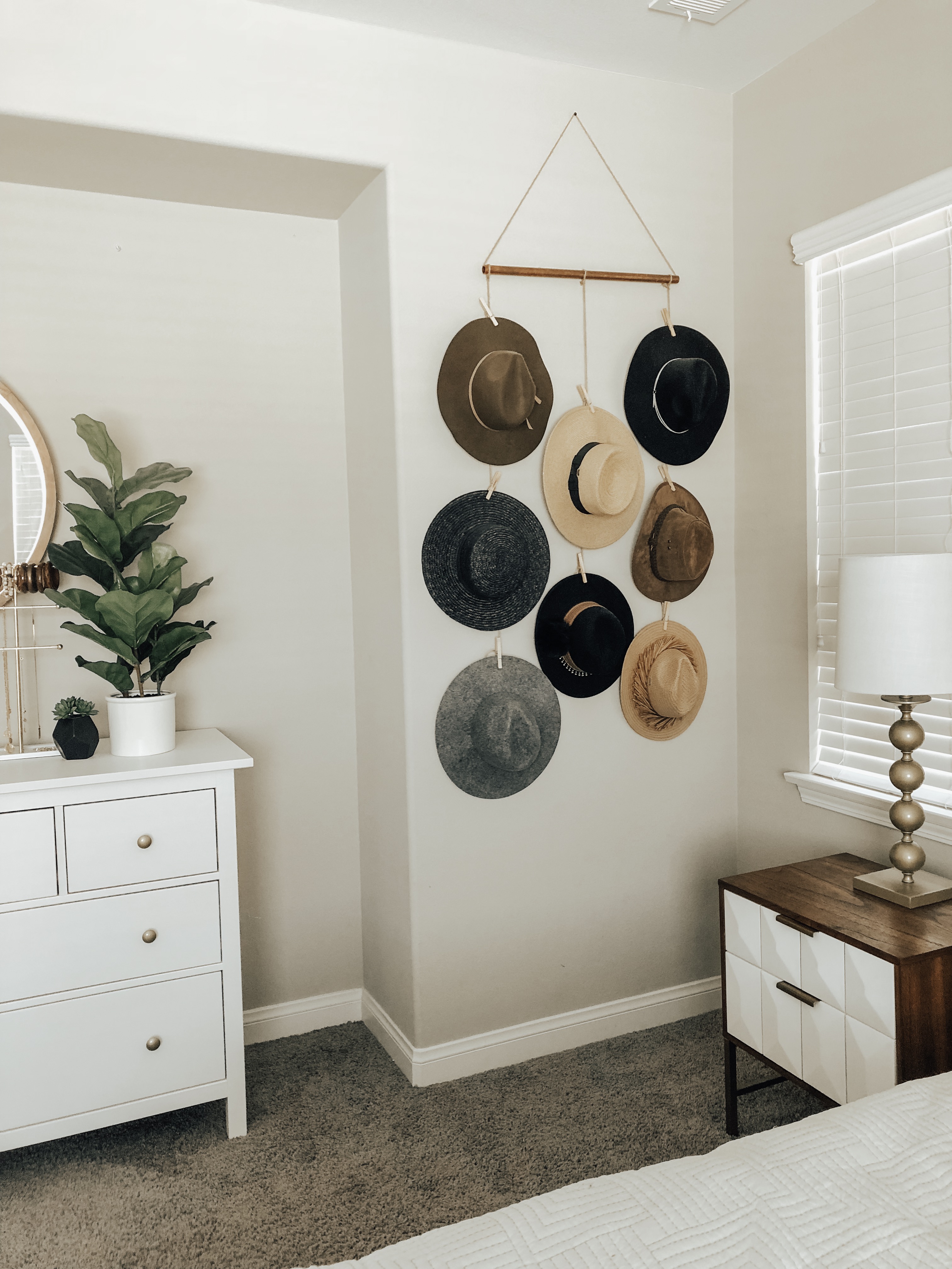 DIY HAT WALL TUTORIAL= Jaclyn De Leon Style + Looking for an affordable way to organize and display your hats? I've got the easiest DIY for under $20 and with only 4 supplies. Turn your hats into a boho chic home decor piece.