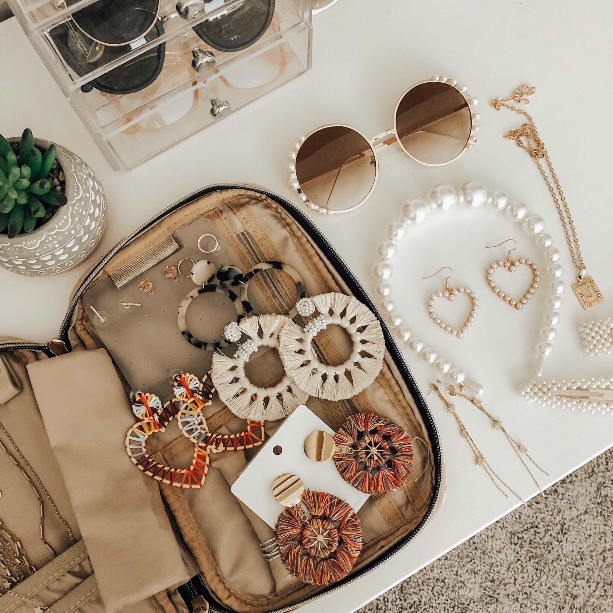 AUGUST TOP 10- Jaclyn De Leon Style + Sharing all of last months top selling items from my favorite travel jewelry case, a cute walmart ruffle top, leopard tank, the best snakeskin booties and so much more!