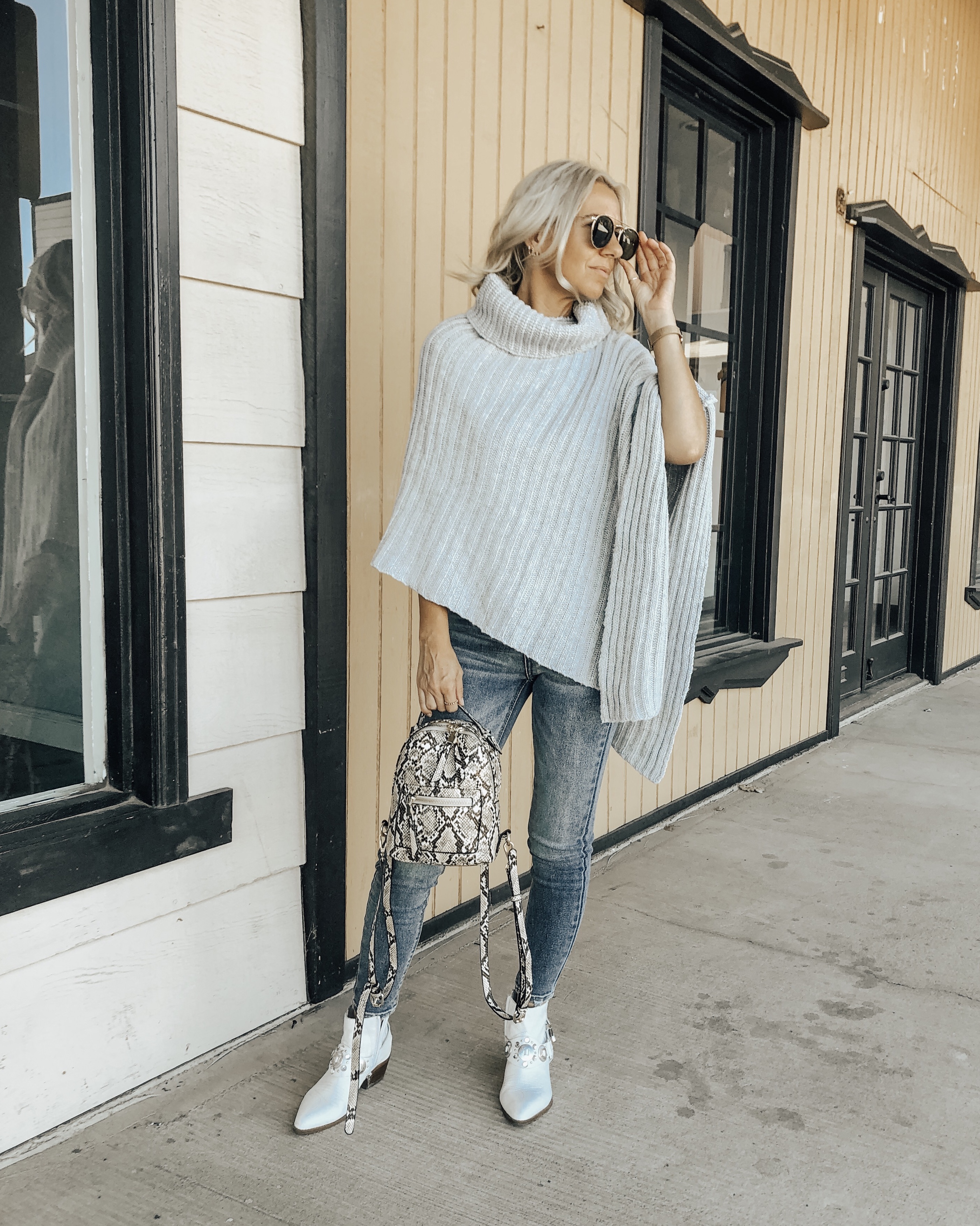 TREND ALERT: THE PONCHO SWEATER- Jaclyn De Leon Style + the poncho sweater trend is back in a big way! It's comfy + cozy and the perfect piece to throw over a top and jeans to completely update your look. This Amazon find is a must- have piece