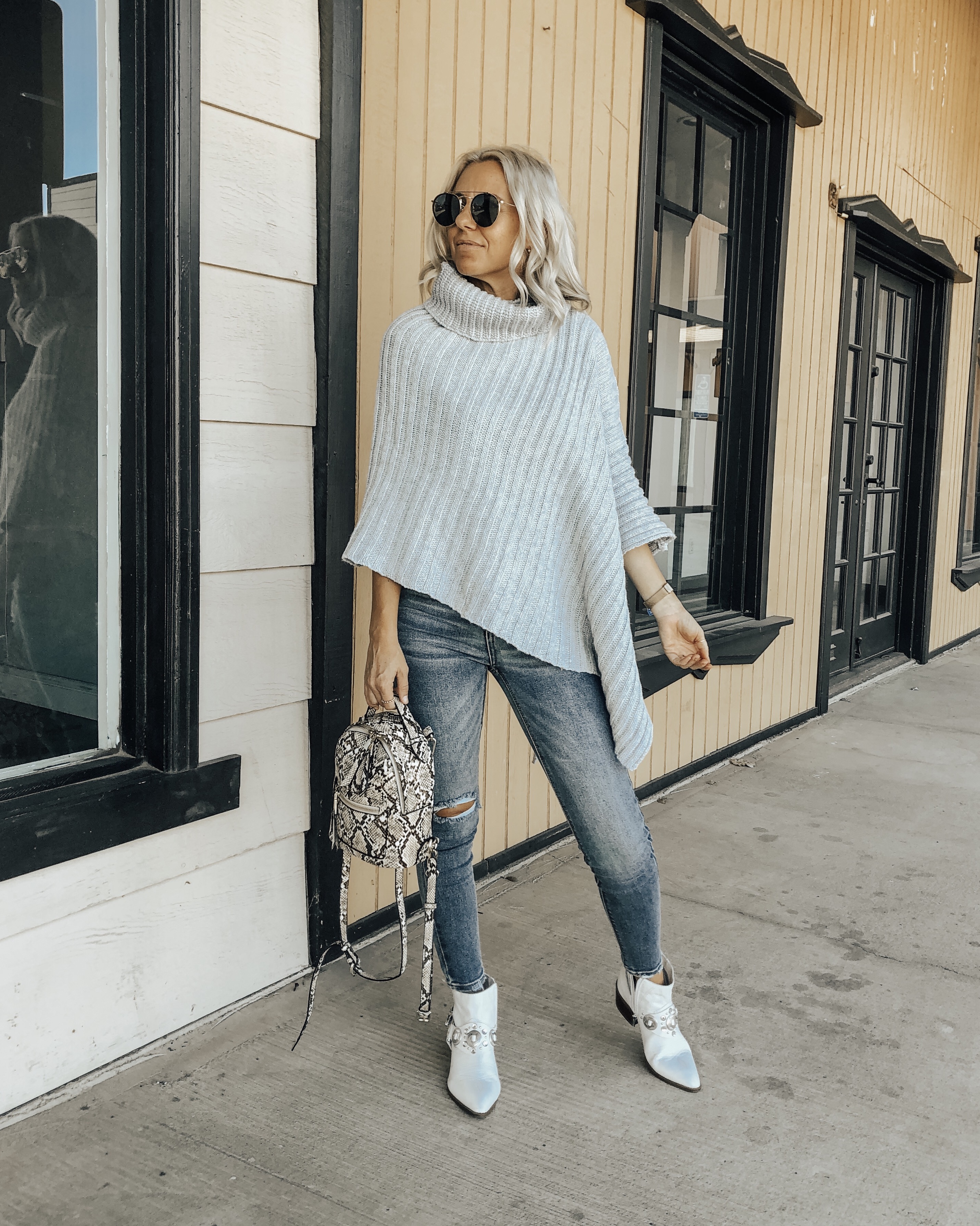 TREND ALERT: THE PONCHO SWEATER- Jaclyn De Leon Style + the poncho sweater trend is back in a big way! It's comfy + cozy and the perfect piece to throw over a top and jeans to completely update your look. This Amazon find is a must- have piece