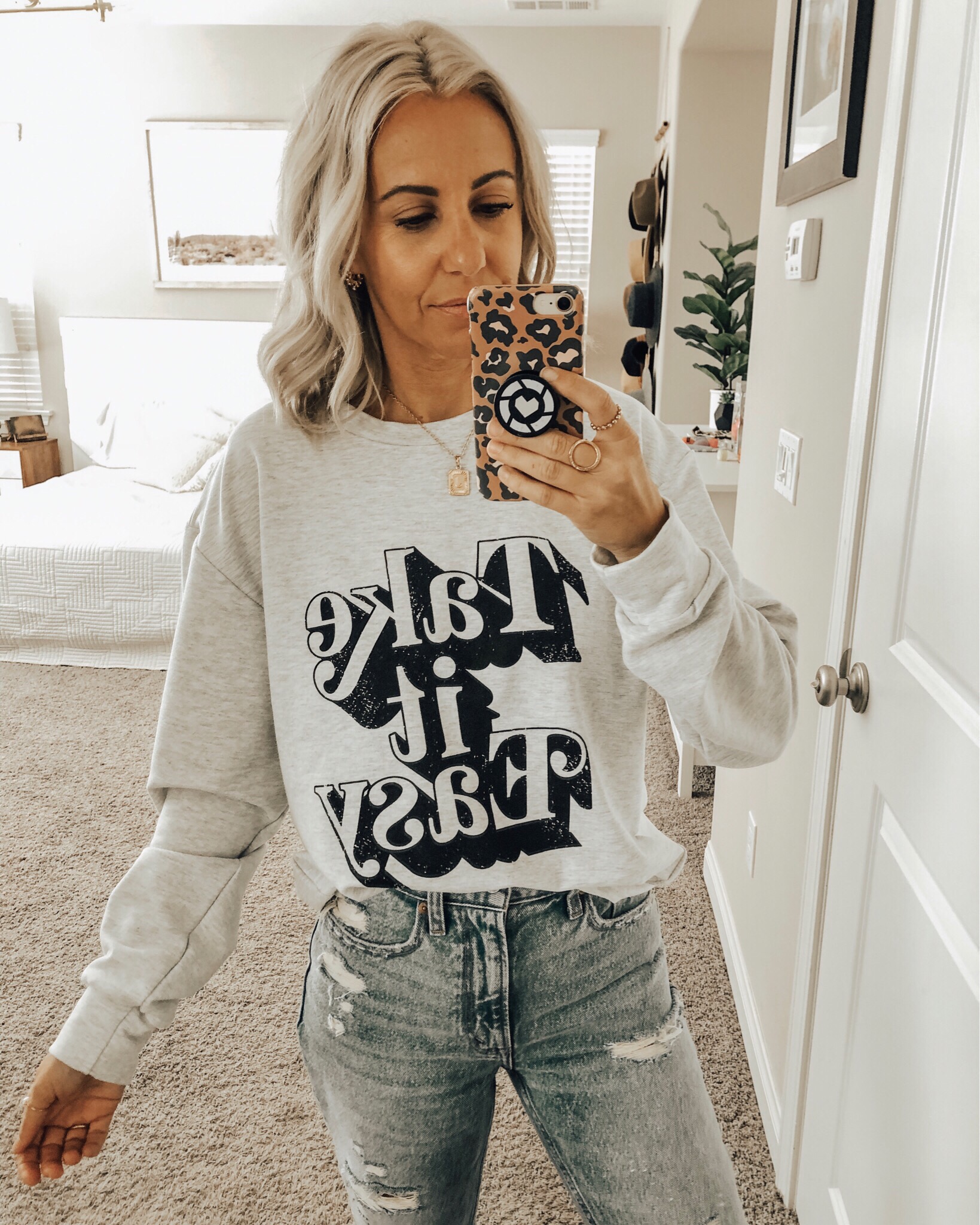 OCTOBER TOP 10- Jaclyn De Leon Style + Sharing the best selling items from the month of October which include a leopard sweater, huggie hoop earrings, graphic tees + sweatshirts, faux fur slippers, striped sweaters, western booties and denim
