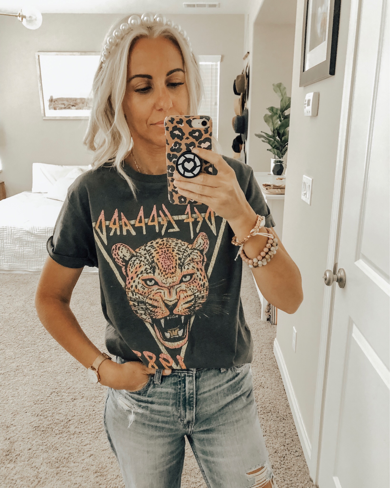 OCTOBER TOP 10- Jaclyn De Leon Style + Sharing the best selling items from the month of October which include a leopard sweater, huggie hoop earrings, graphic tees + sweatshirts, faux fur slippers, striped sweaters, western booties and denim