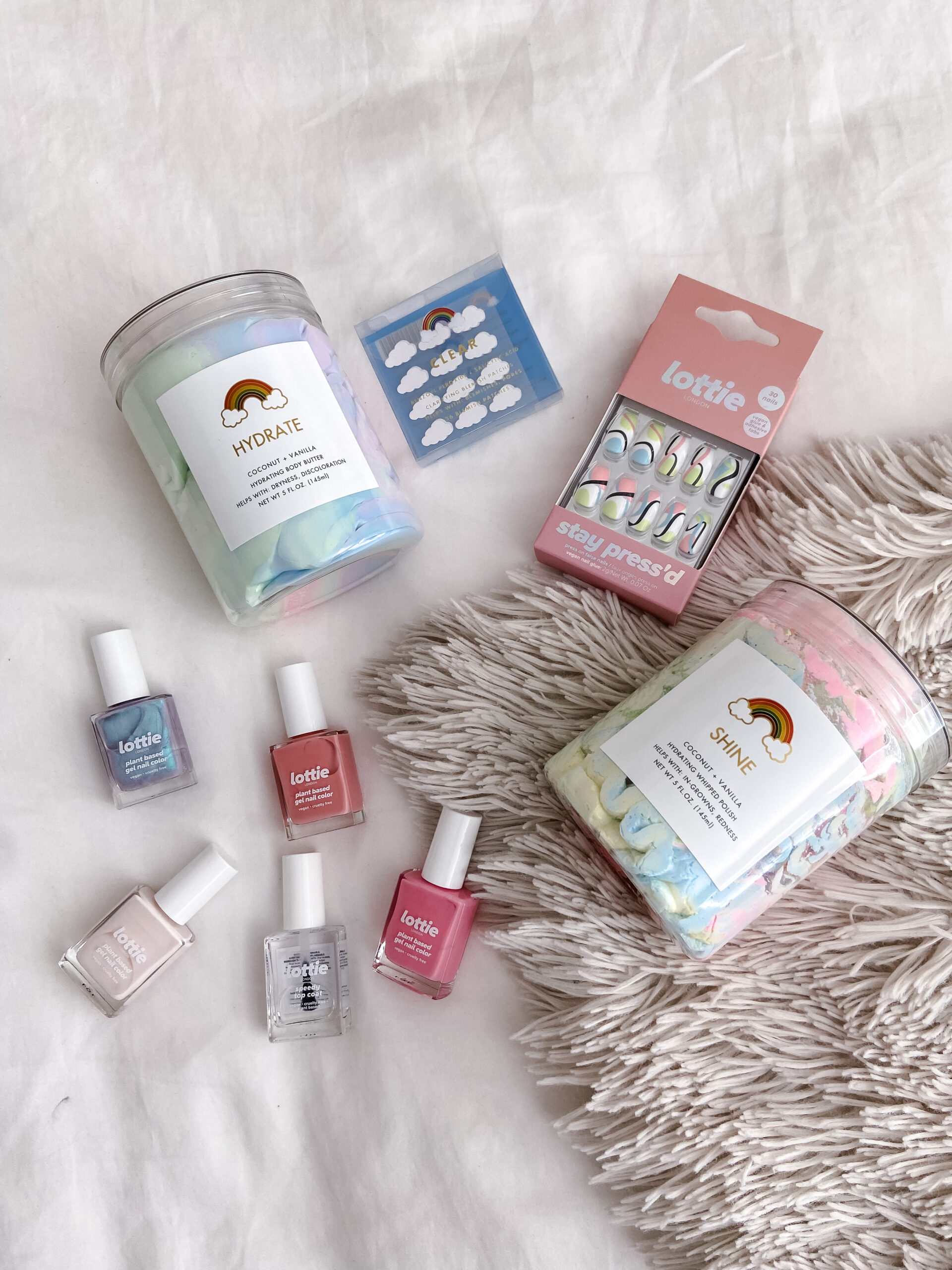 NEW WALMART BEAUTY FINDS-Jaclyn De Leon. Colorful brands discovered at Walmart. Lottie London has fun nail polish and press on nails. Rainbow beauty has a variety of face and body products that are colorful and clean. Perfect for summer.