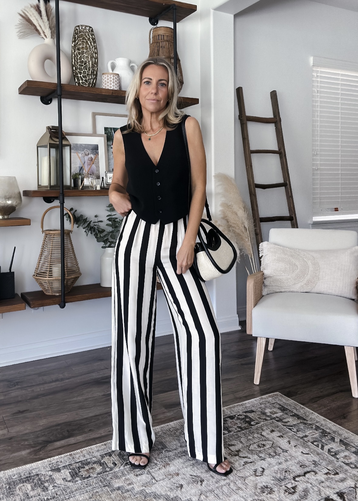 What to wear with black and white striped pants? Outfits and tips